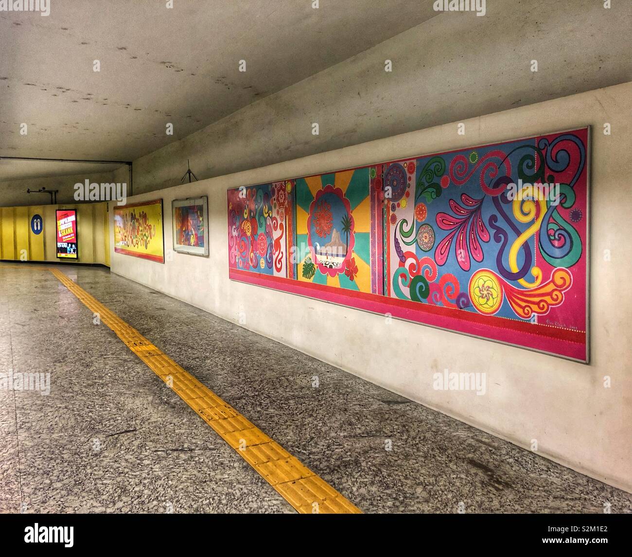 Artwork brightens up the walkway of the underground metro station in Ipanema, Rio de Janeiro, Brazil. Stock Photo