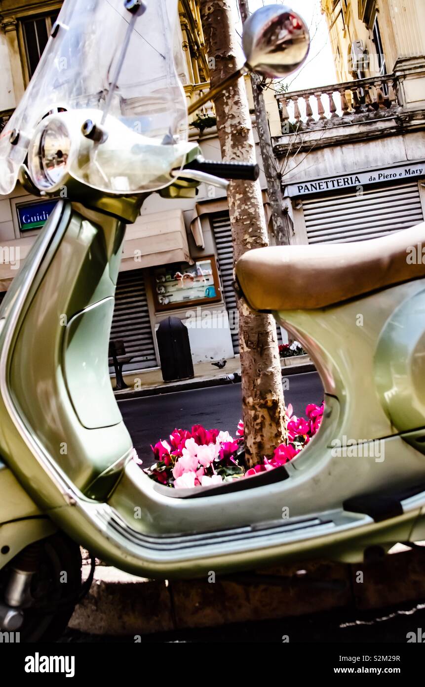Sanremo, April 2019: moto and flowers Stock Photo - Alamy
