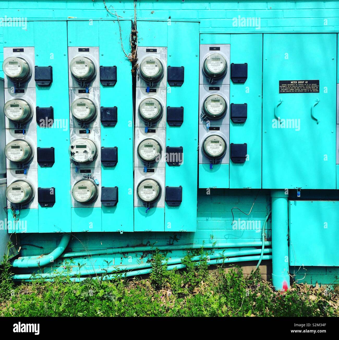 Apartment meters on turquoise - Smartphone Captured Stock Image
