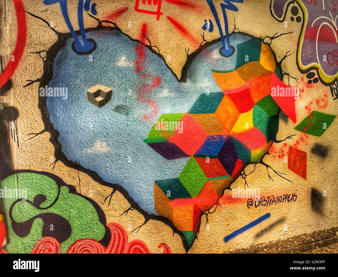 A graffiti heart painted on a building wall in Rio de Janeiro, Brazil. - Smartphone Captured Stock Image