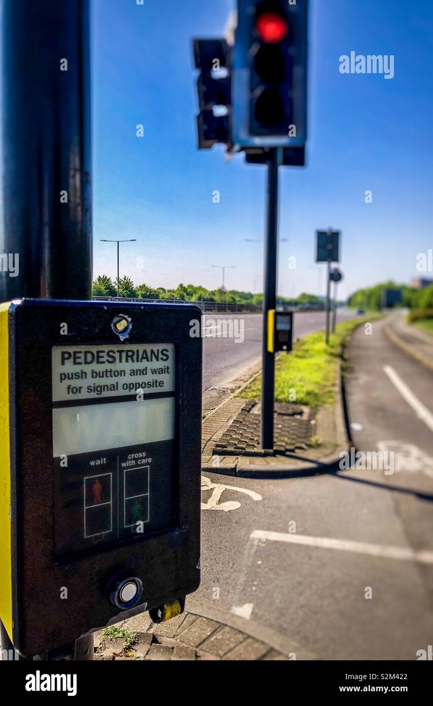 UK Pedestrian crossing traffic signals press button control. Stock Photo