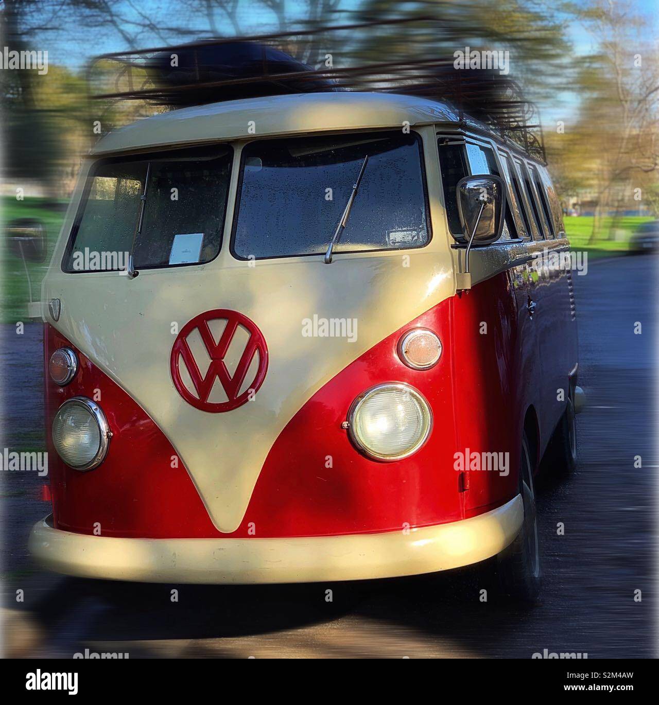 The classical model of Volkswagen van in red and oyster colour Stock Photo  - Alamy