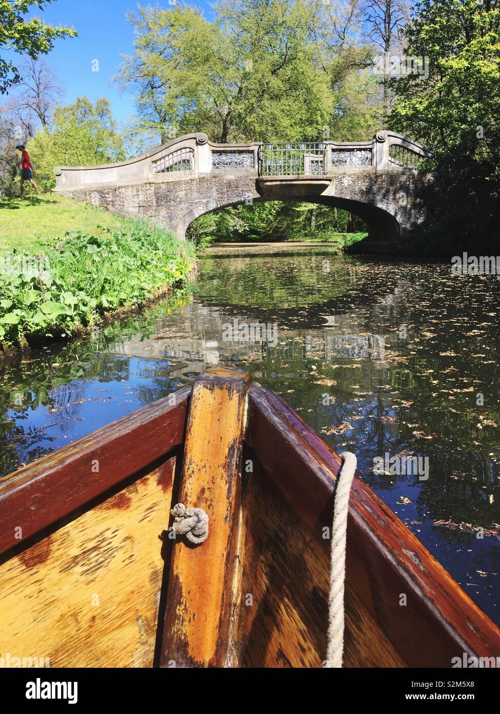A Boat Ride on a sunny spring day in The Buergerpark in Bremen, Northern Germany - Smartphone Captured Stock Image