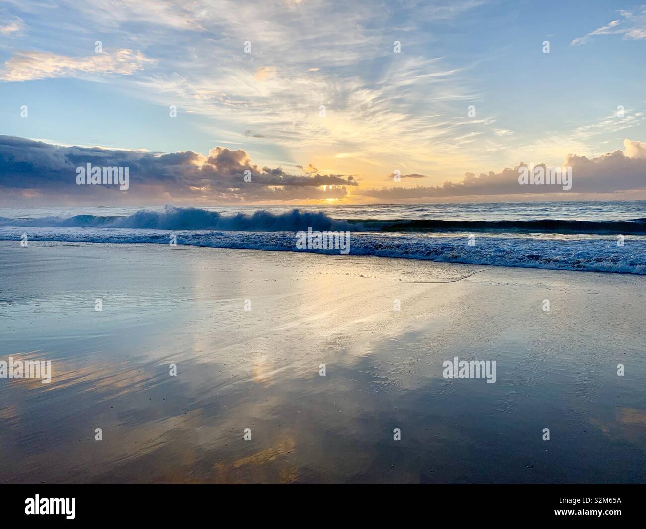 Sunrise over the ocean at Black Head Beach on the mid north coast of New South Wales, Australia - Smartphone Captured Stock Image