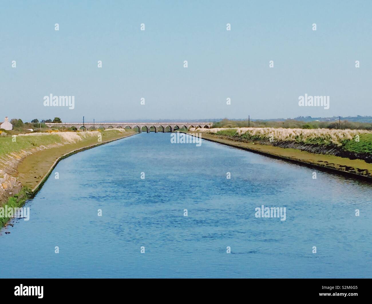 Nature reserve canal and aqueduct at Malltraeth, isle of Anglesey, Gwynedd, North wales - Smartphone Captured Stock Image