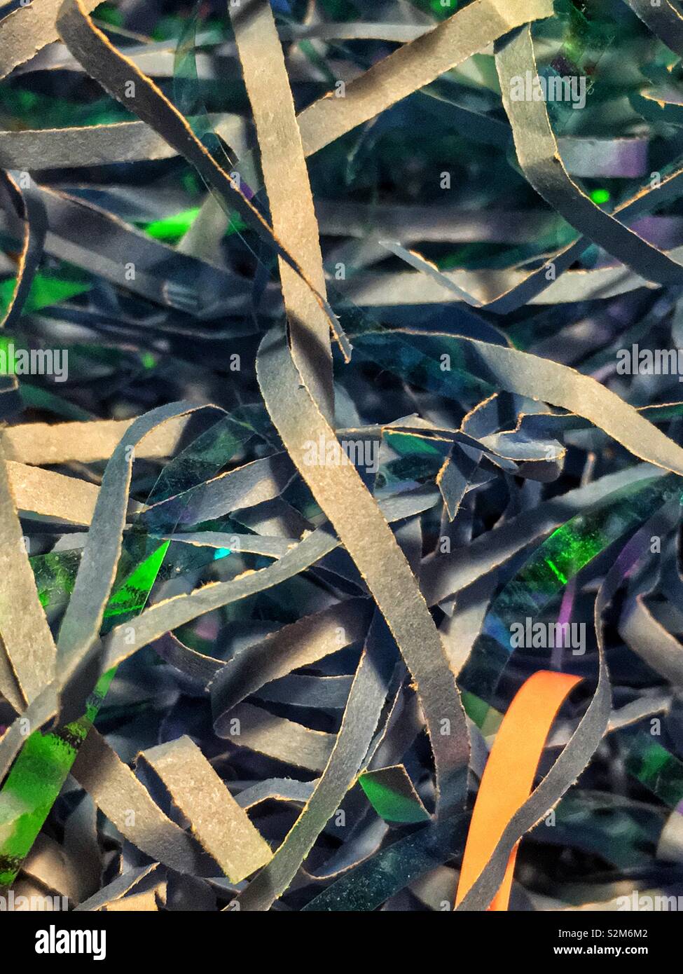 Stack of blue confetti strings with sparkles. - Smartphone Captured Stock Image