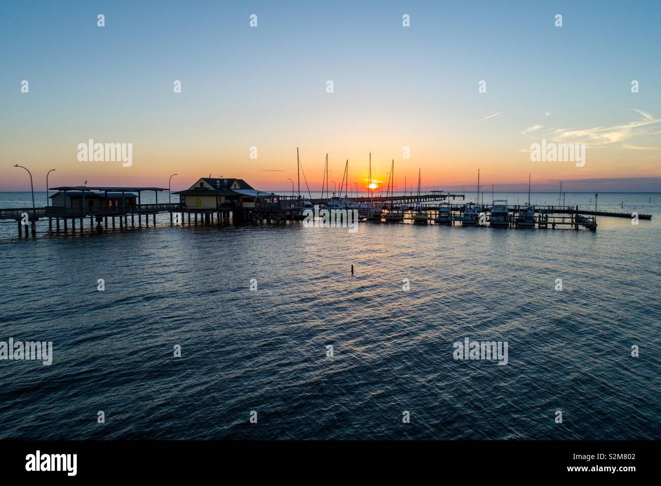 Fairhope pier on Mobile Bay, Alabama at sunset Stock Photo