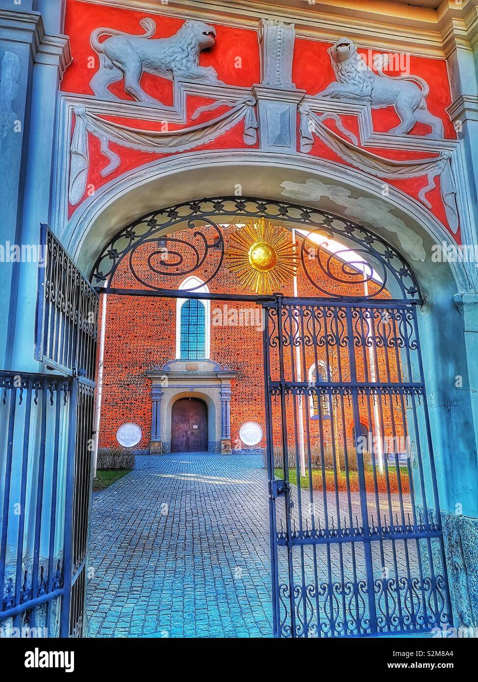 Decorative carved lions above gateway, Strangnas Cathedral, Strangnas, Sweden, Scandinavia - Smartphone Captured Stock Image