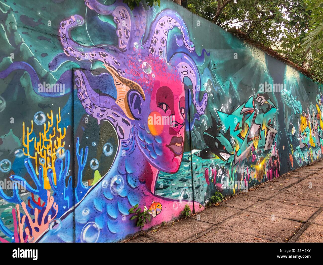 Vibrant multi coloured urban street mural in Rio de Janeiro, Brazil. - Smartphone Captured Stock Image