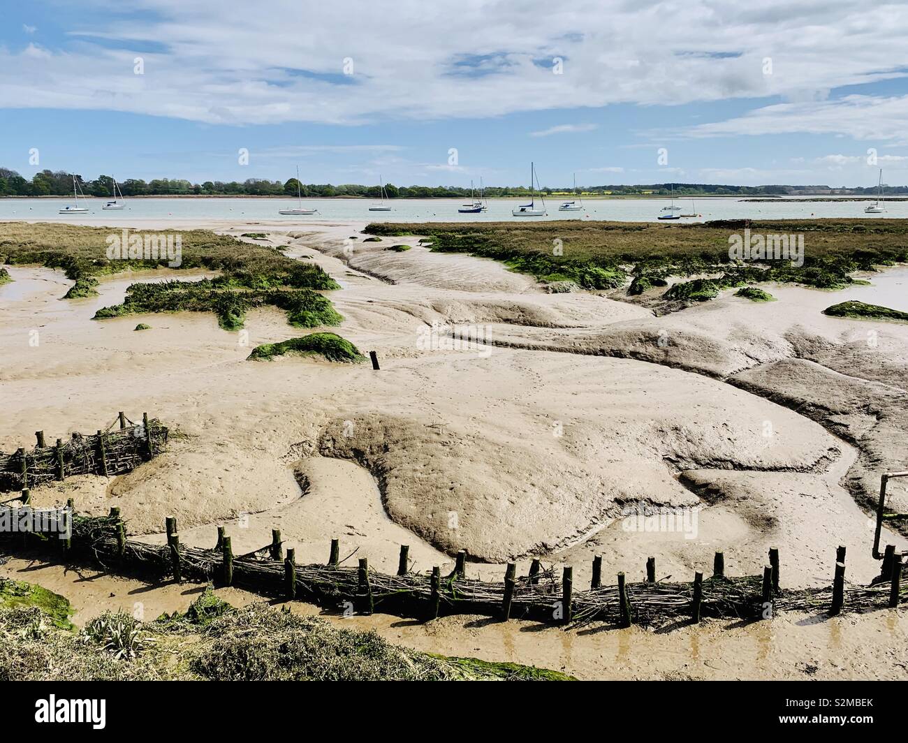Waldringfield, Suffolk, UK - 26 April 2019: Muddy riverbed at low tide. Stock Photo