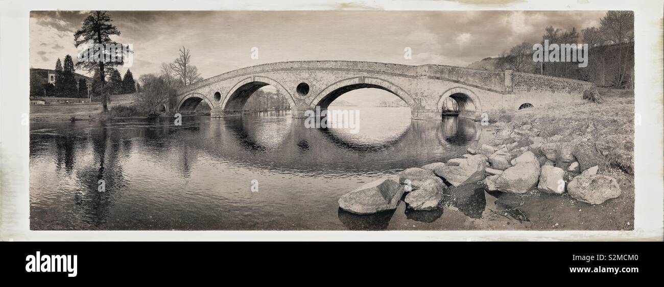 Hipstamatic vintage style panorama of old bridge on Loch Tay, Kenmore, Scotland. Stock Photo