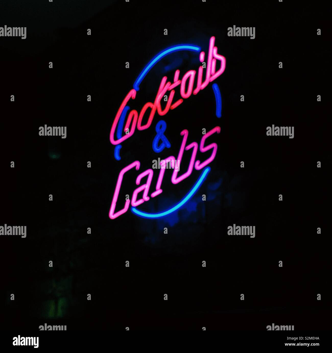 Cocktails and carbs neon sign Stock Photo