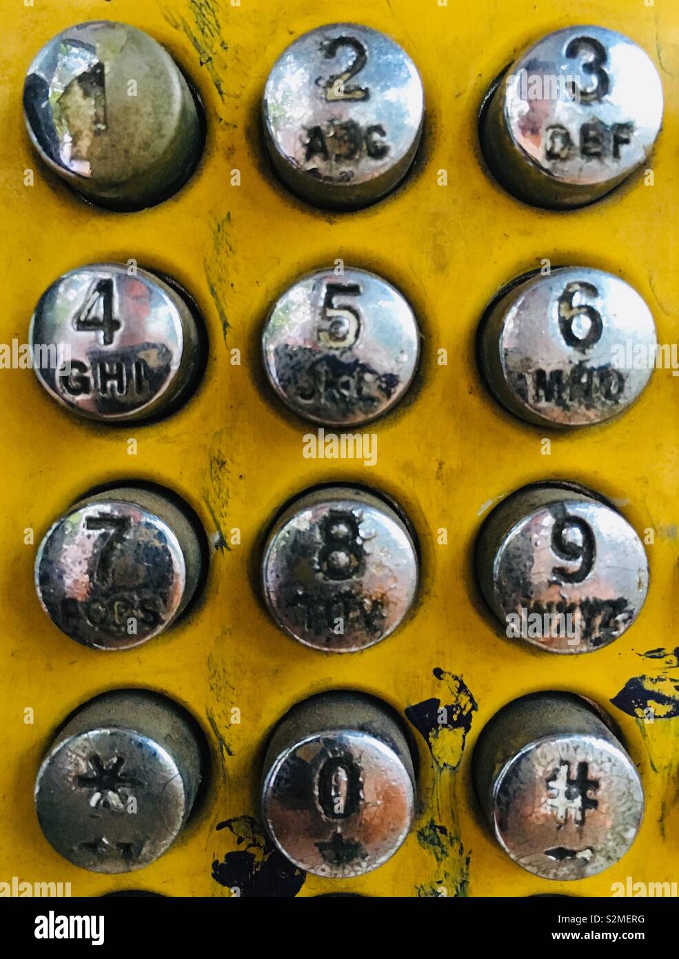 old and rust phone button number Stock Photo