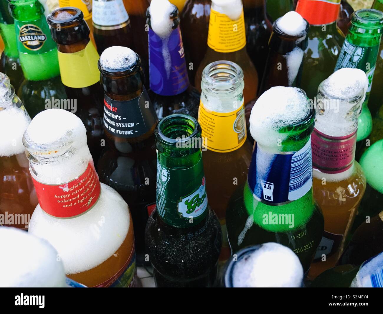 Lots of opened bottles of beer - Smartphone Captured Stock Image