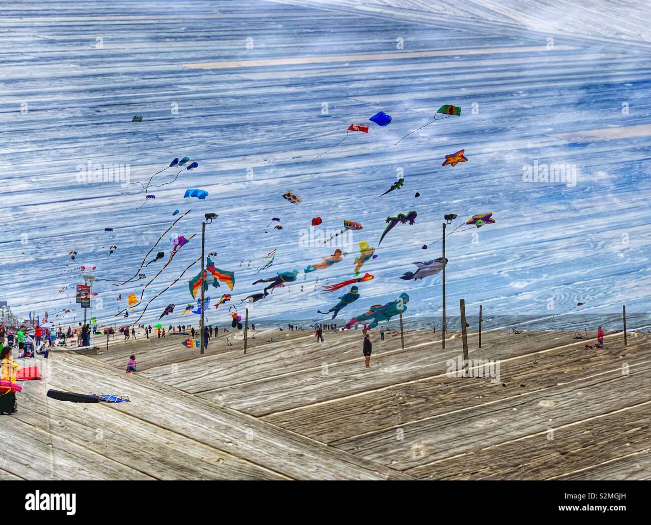 Double exposure of Kites Flying and a boardwalk - Smartphone Captured Stock Image
