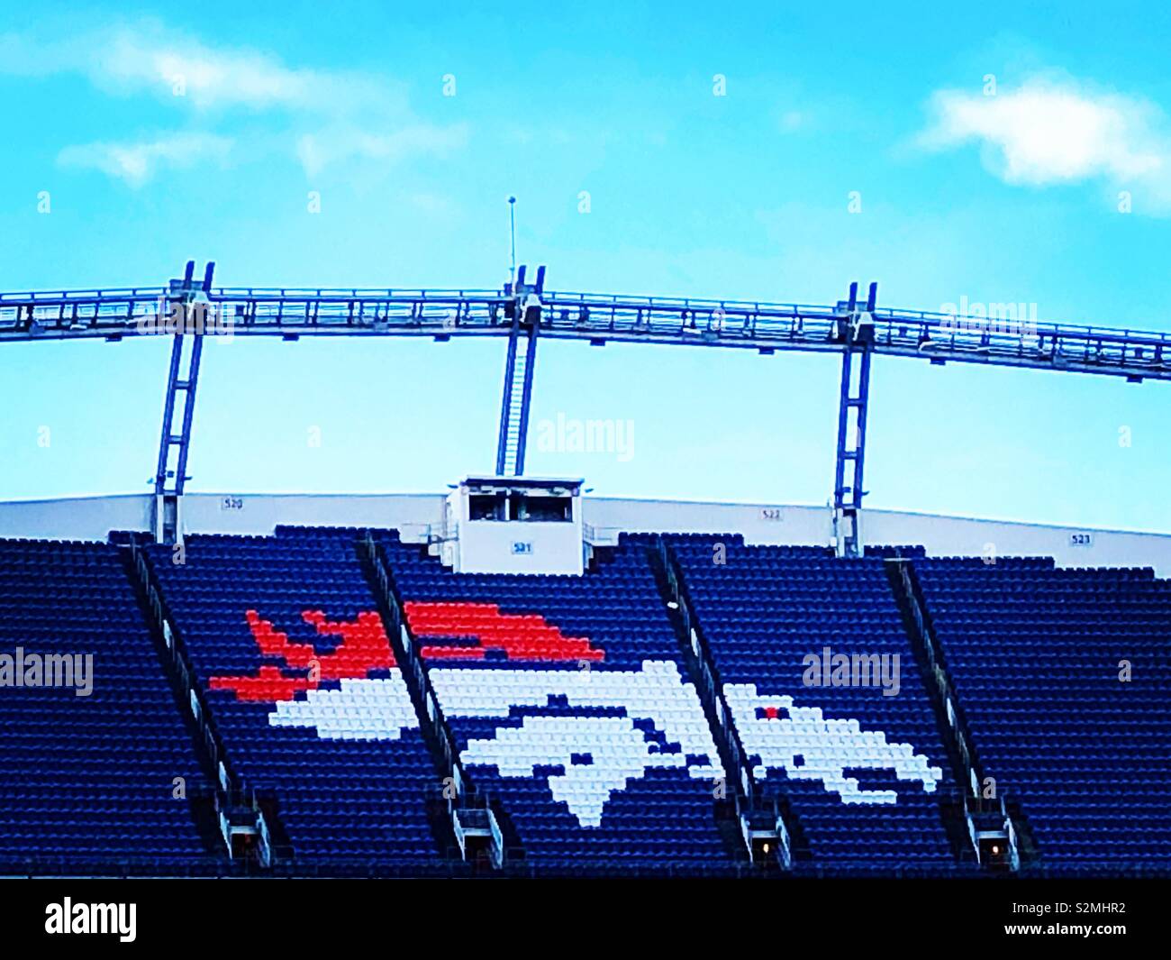 aerial view of Mile High Stadium Denver home of Denver Broncos with Rocky  mountains in background Stock Photo - Alamy