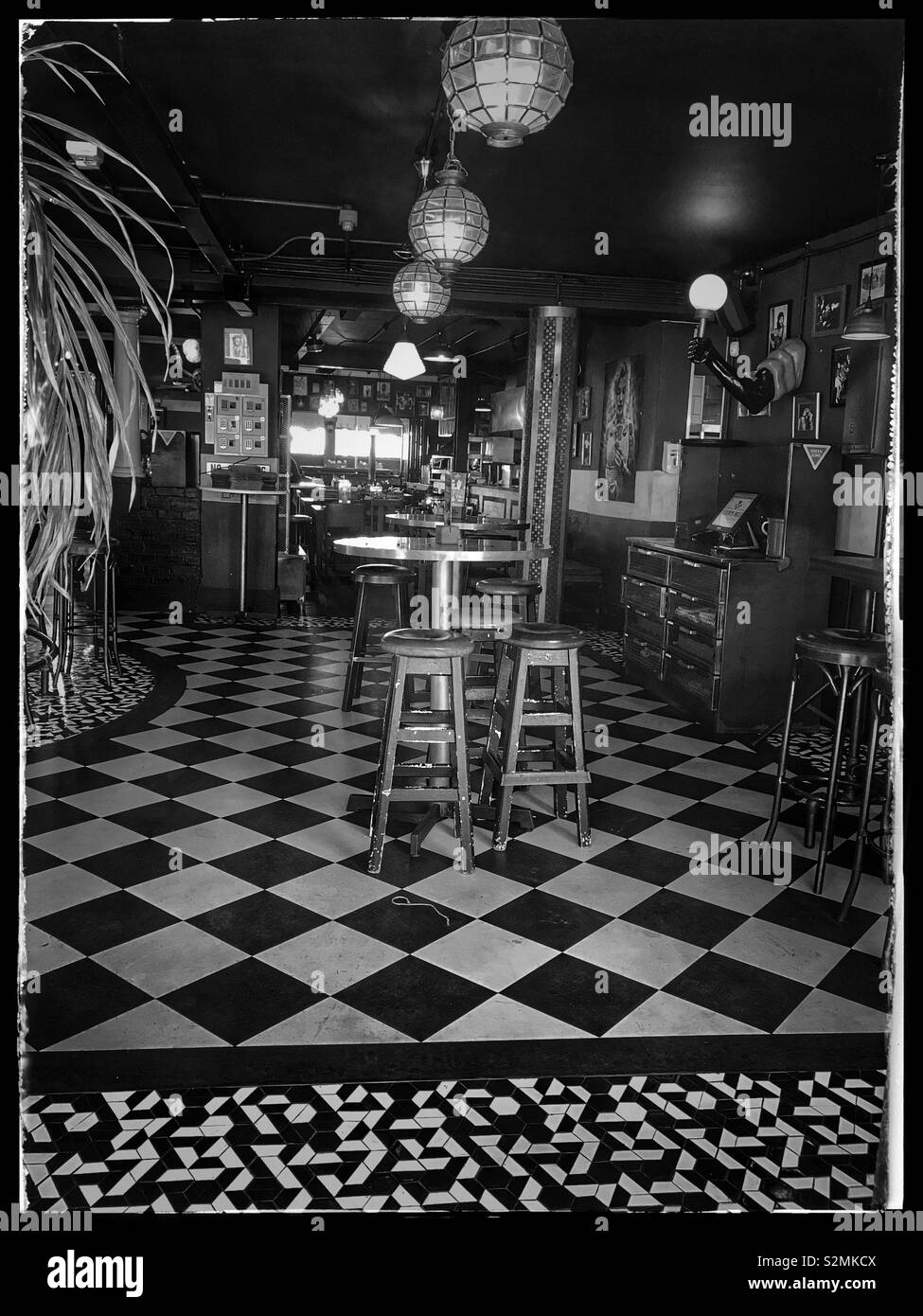 Interior of Tiger’s Milk, Kloof Street, Cape Town, South Africa. Black and white photo. - Smartphone Captured Stock Image