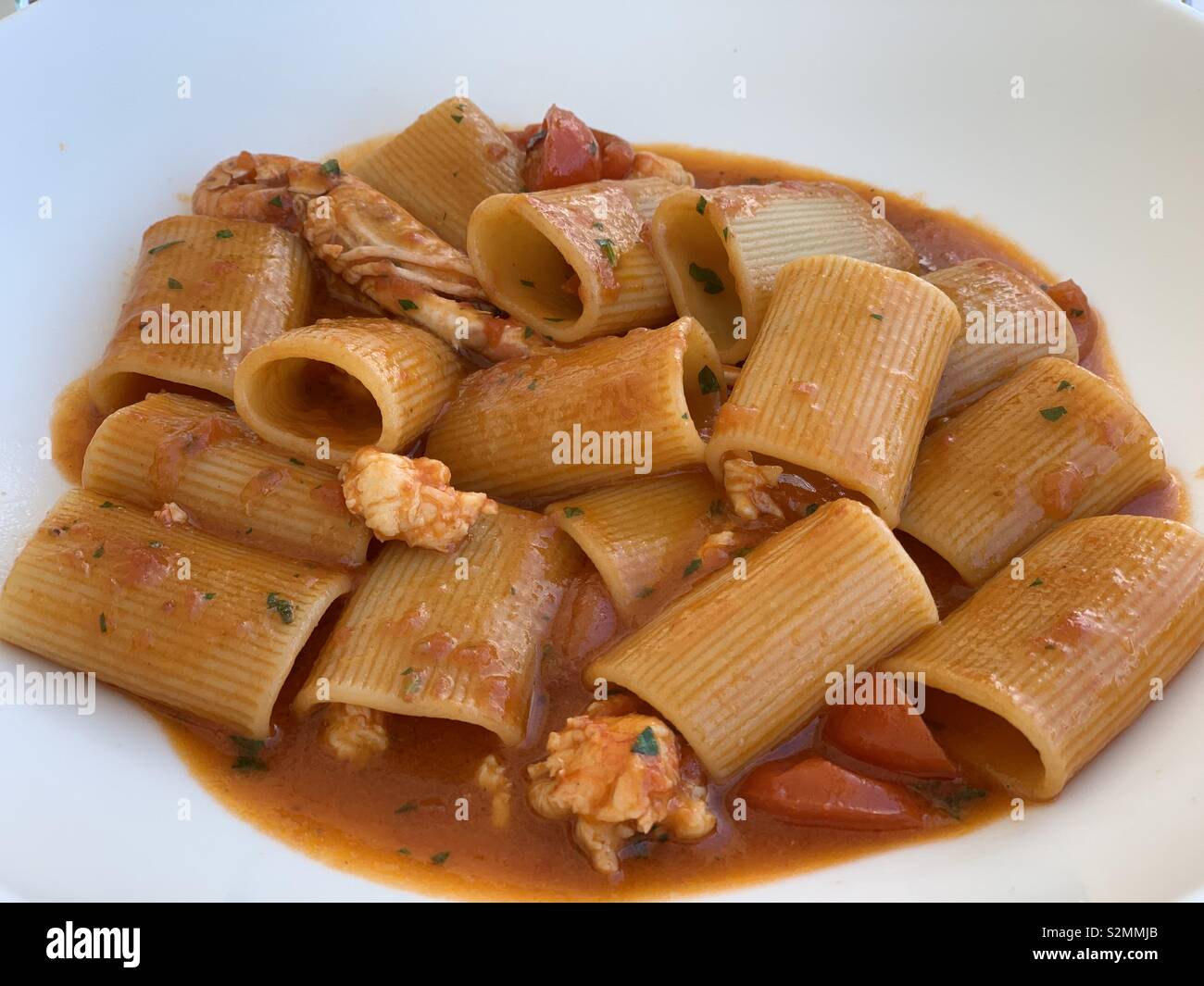 Mezze maniche with lobster at the restaurant - Smartphone Captured Stock Image