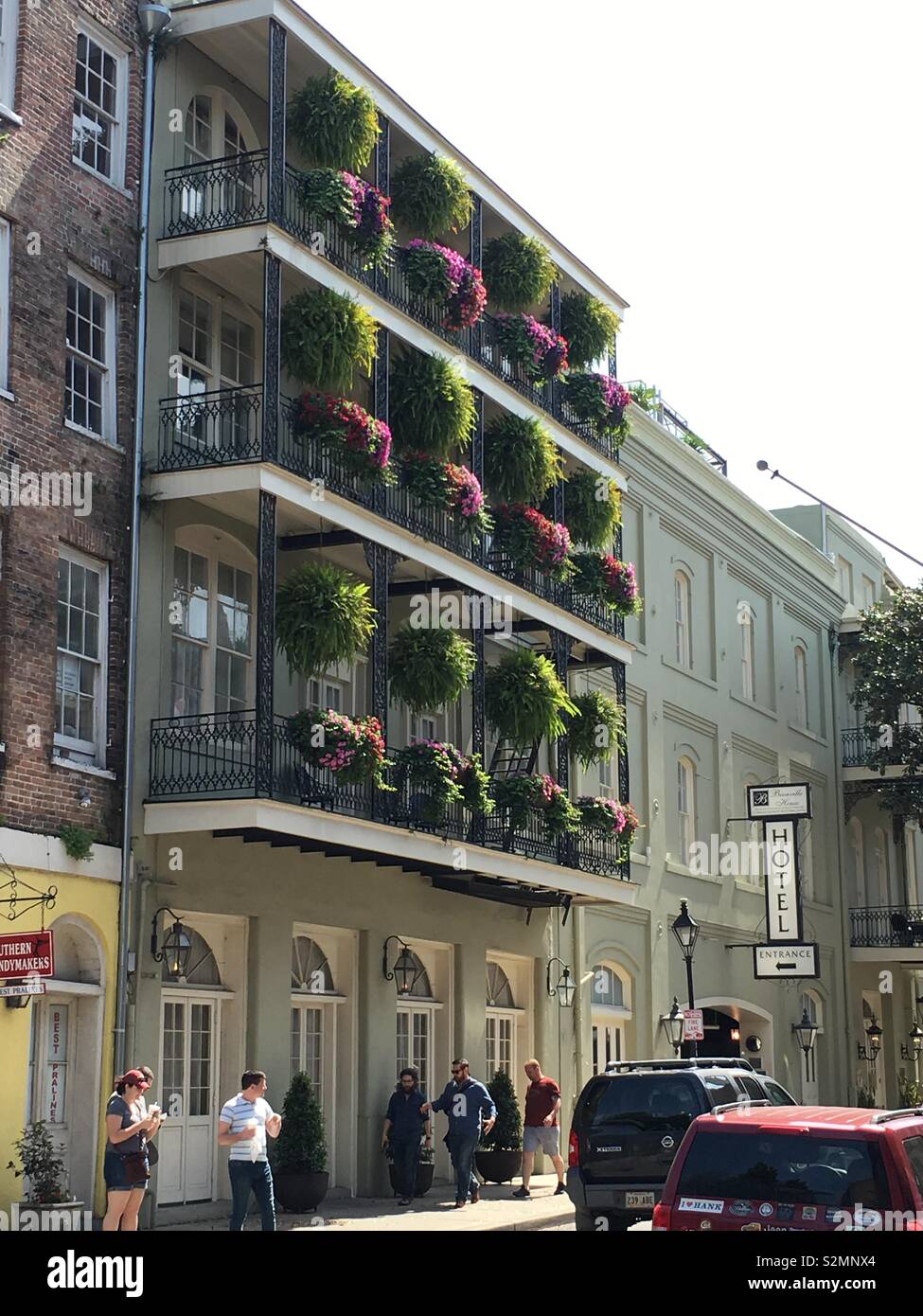 Beautiful flowers on the balconies of the Bienville House Hotel in the