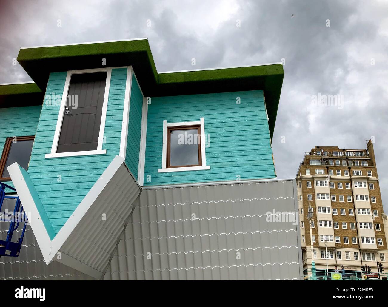 The new upside Down House on Brighton seafront a surrealist perspective Stock Photo