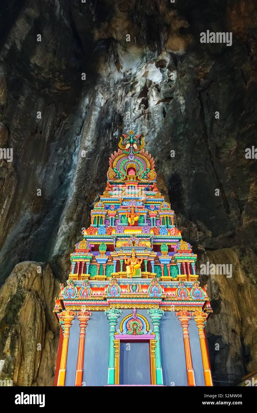 Tiny, multicolored hindu tempel in a cave in Malaysia Stock Photo
