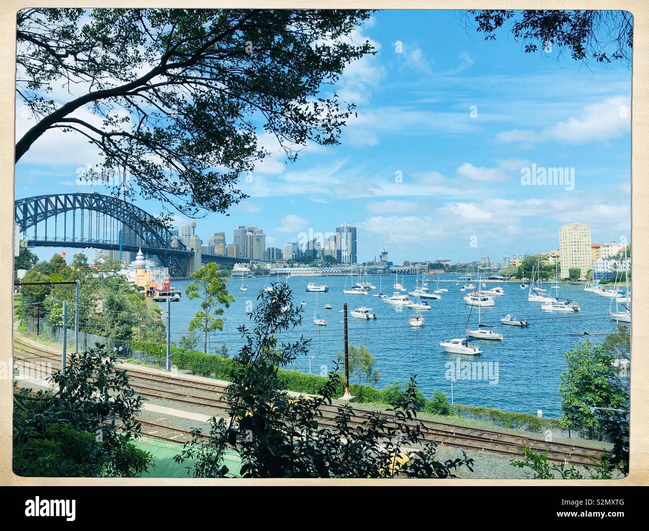 View of Sydney Harbour Bridge, Luna Park and Lavender Bay, Sydney, New South Wales, Australia Stock Photo