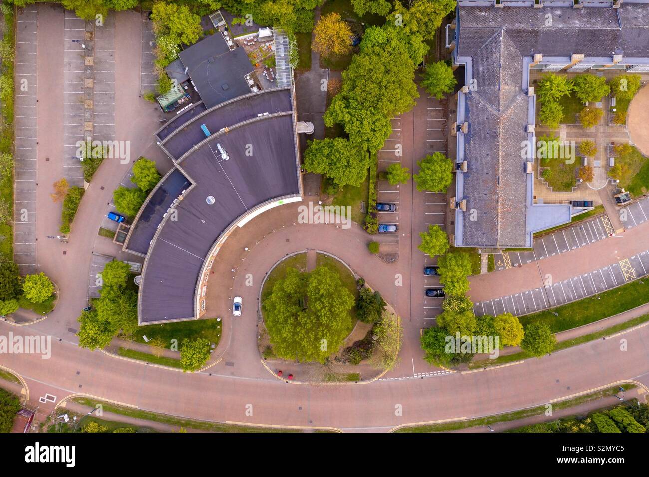 Aerial photo of a crescent shaped business unit from above - Smartphone Captured Stock Image