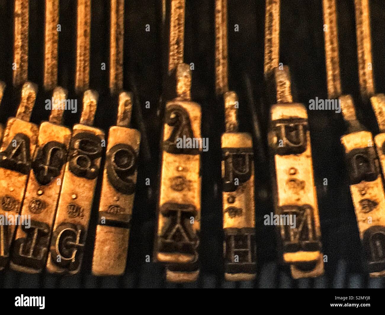 Soft focus Closeup of letter printing keys in an antique typewriter
