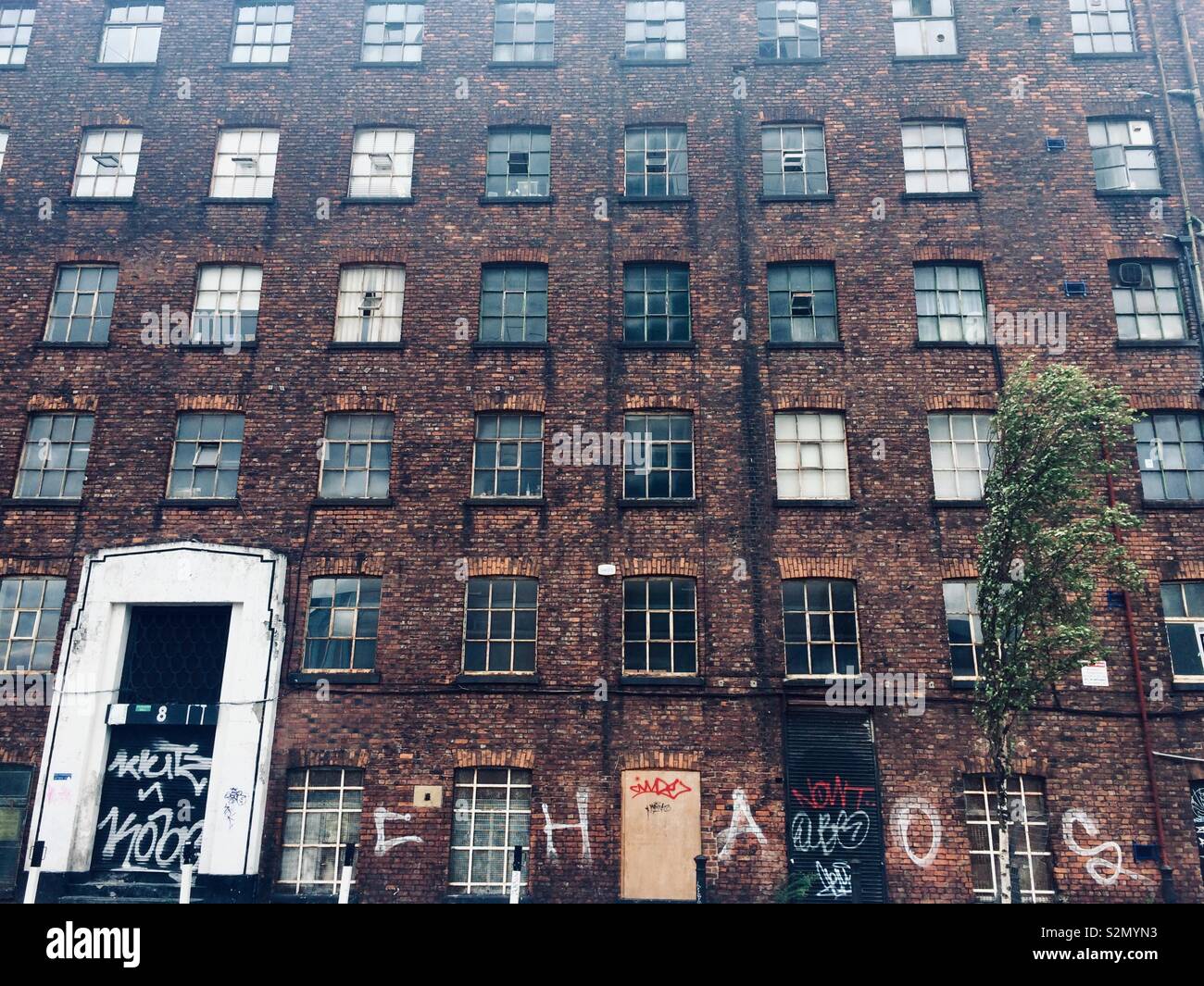 Old abandoned brick warehouse building, Manchester Stock Photo