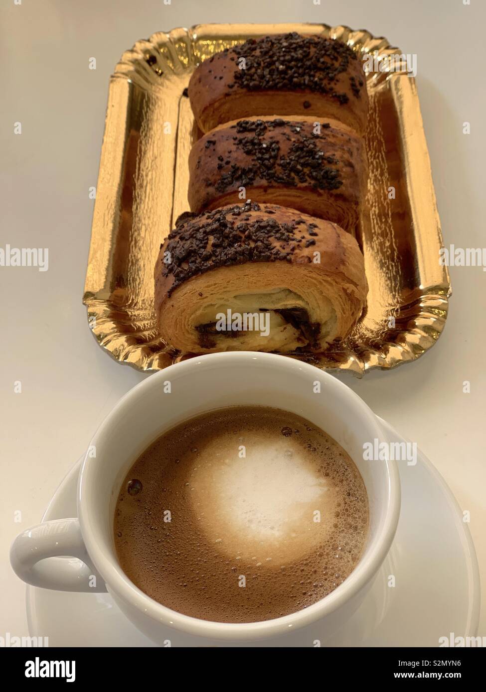 Rich breakfast with chocolate pastries - Smartphone Captured Stock Image