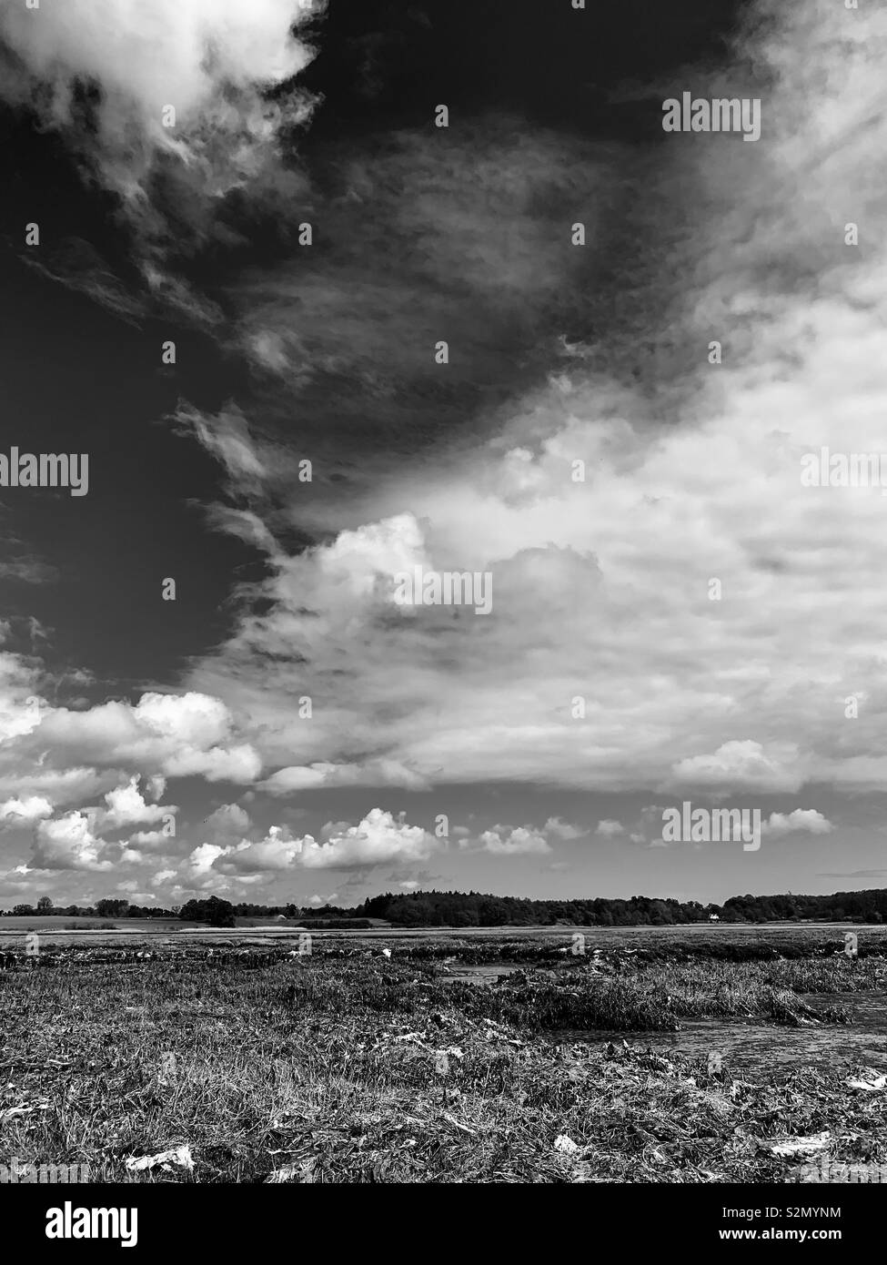Waldringfield, Suffolk, UK - April 2019: Dark sky over the River Deben. - Smartphone Captured Stock Image