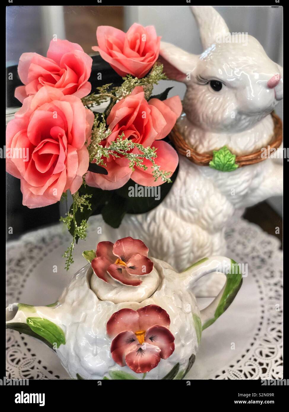Rabbit porcelain container with the roses and a rose tea pot Stock ...