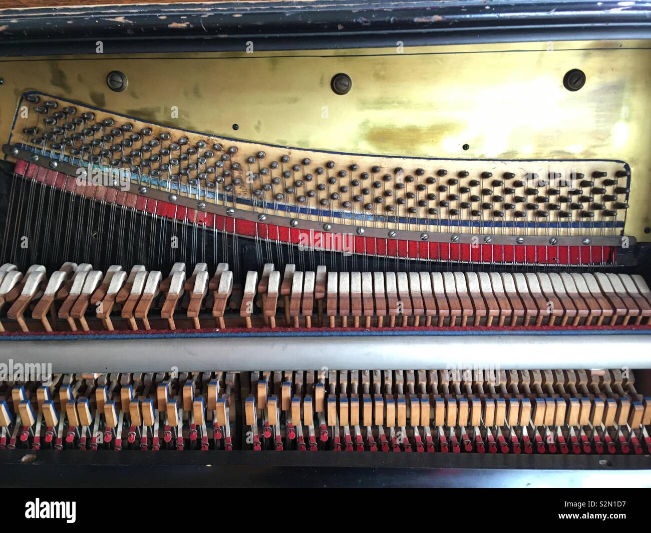 Piano keys interior showing hammers Stock Photo Alamy
