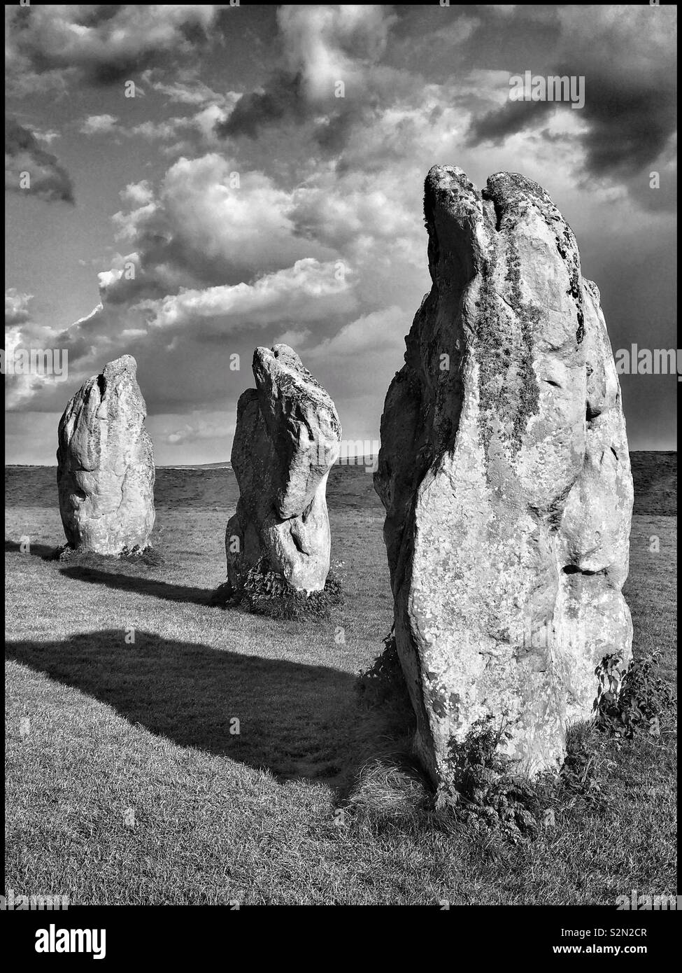 3 of the tall standing stones that make up the Southern Inner Circle of the SE Section of the Circles at Avebury in Wiltshire, England. This is part the largest Megalithic Stone Circle in the world. - Smartphone Captured Stock Image