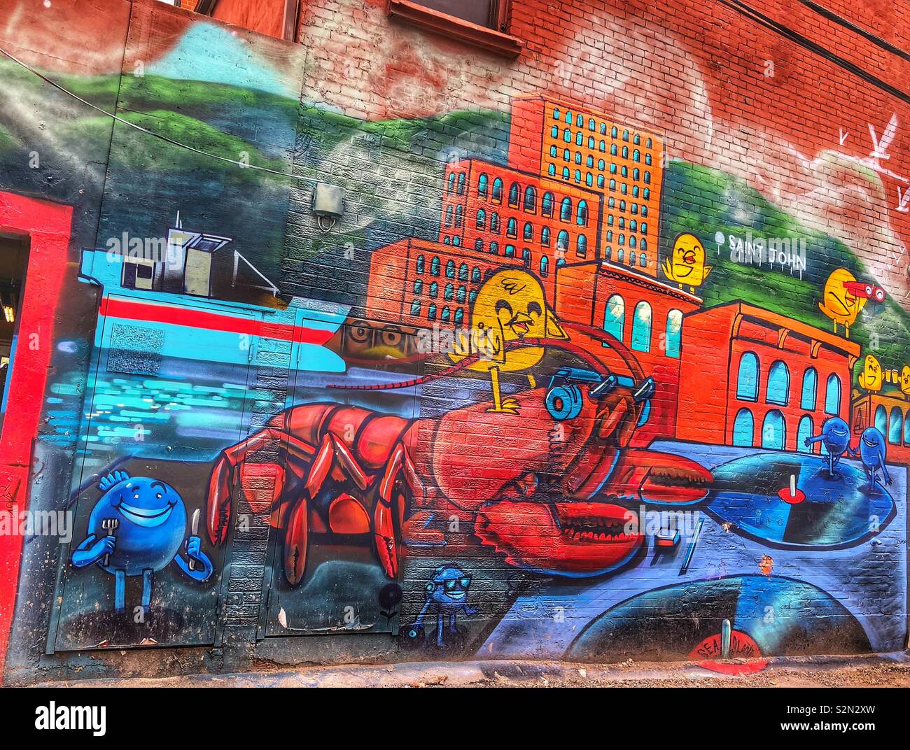 A large colourful mural in downtown Toronto, Canada. - Smartphone Captured Stock Image