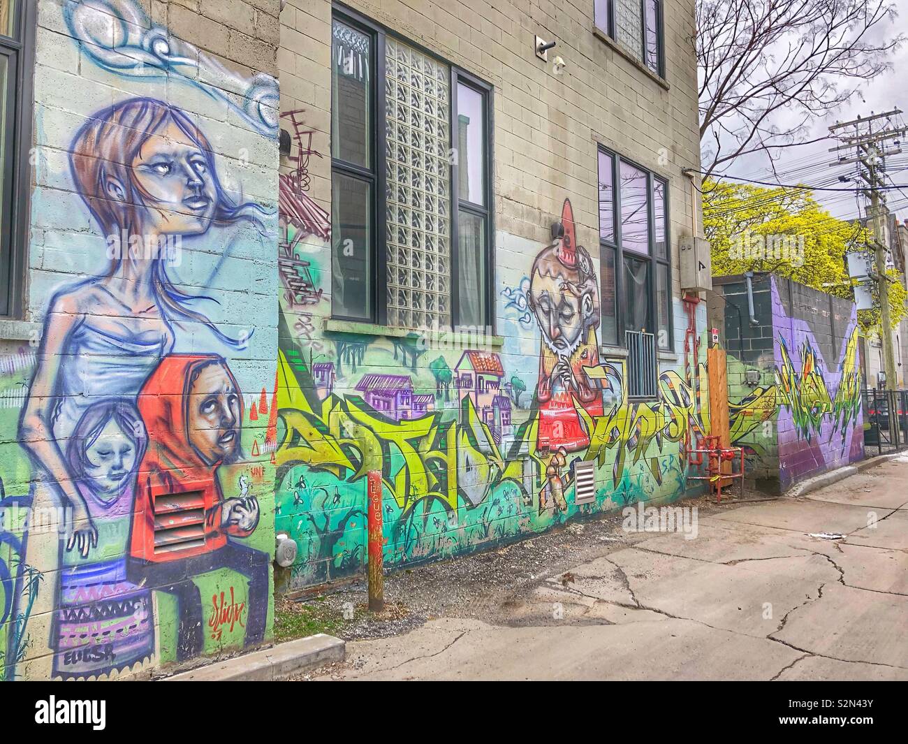 Urban street art in Graffiti Alley in Toronto, Canada. - Smartphone Captured Stock Image
