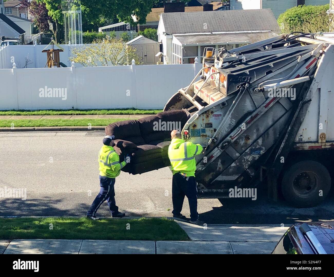 Garbage sanitation truck hires stock photography and images Alamy