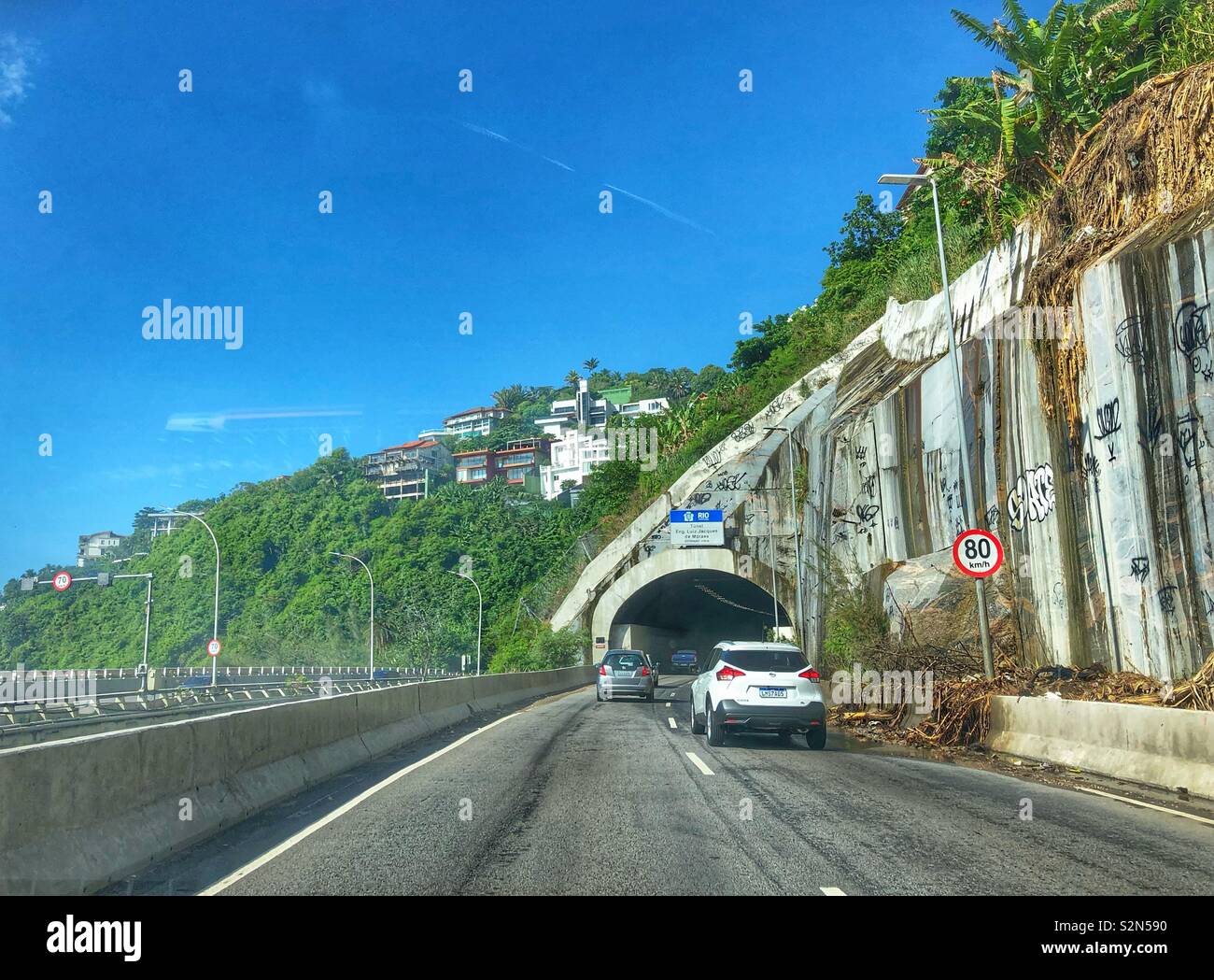 Driving through a mountain tunnel in Rio de Janeiro, Brazil Stock Photo