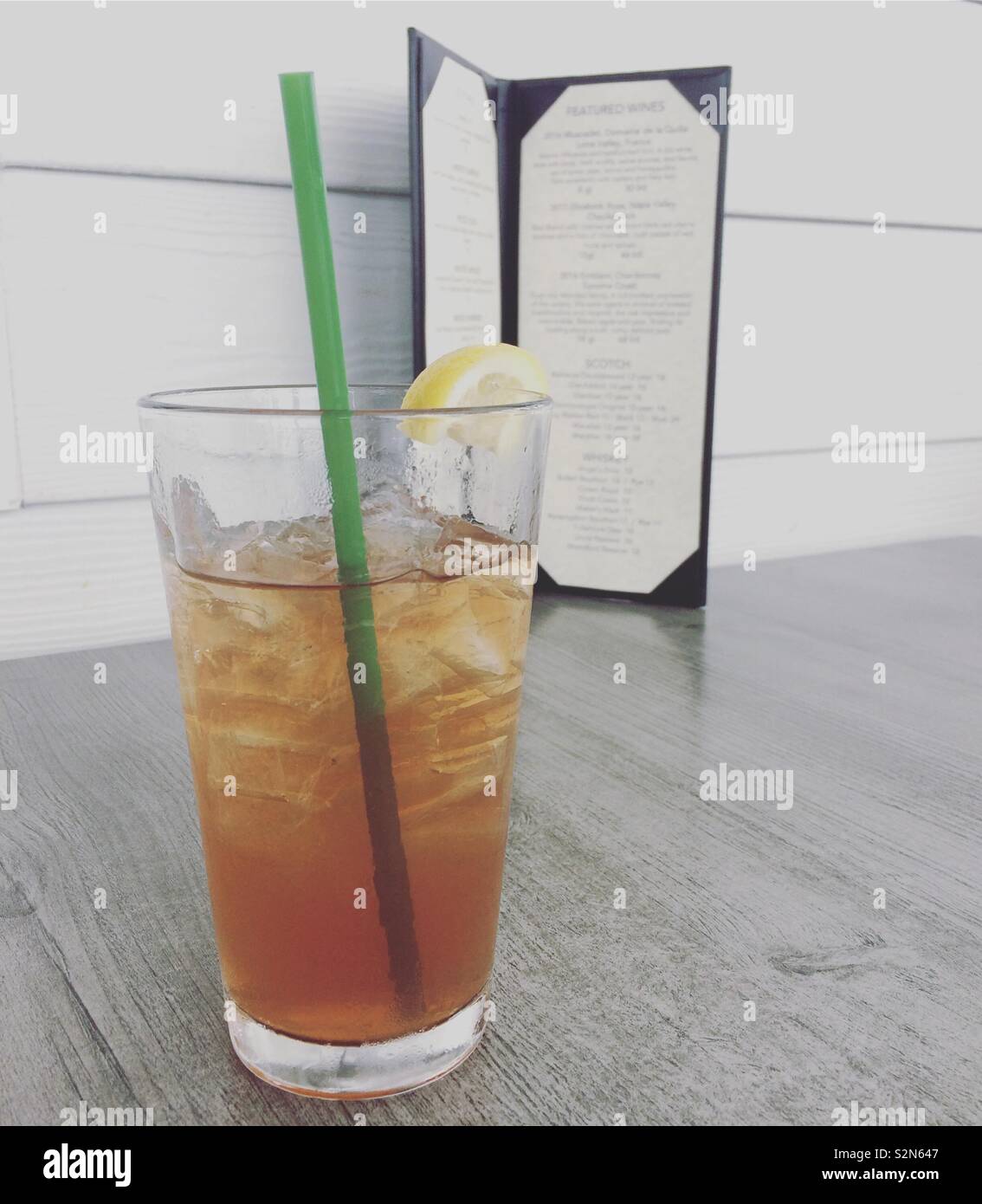 An Arnold Palmer (lemonade and iced tea) on a table at a restaurant
