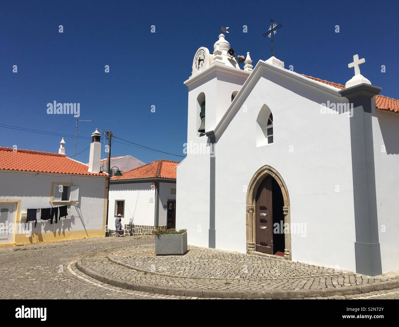 Church and townsquare at town Alte, Algarve,Portugal. Stock Photo