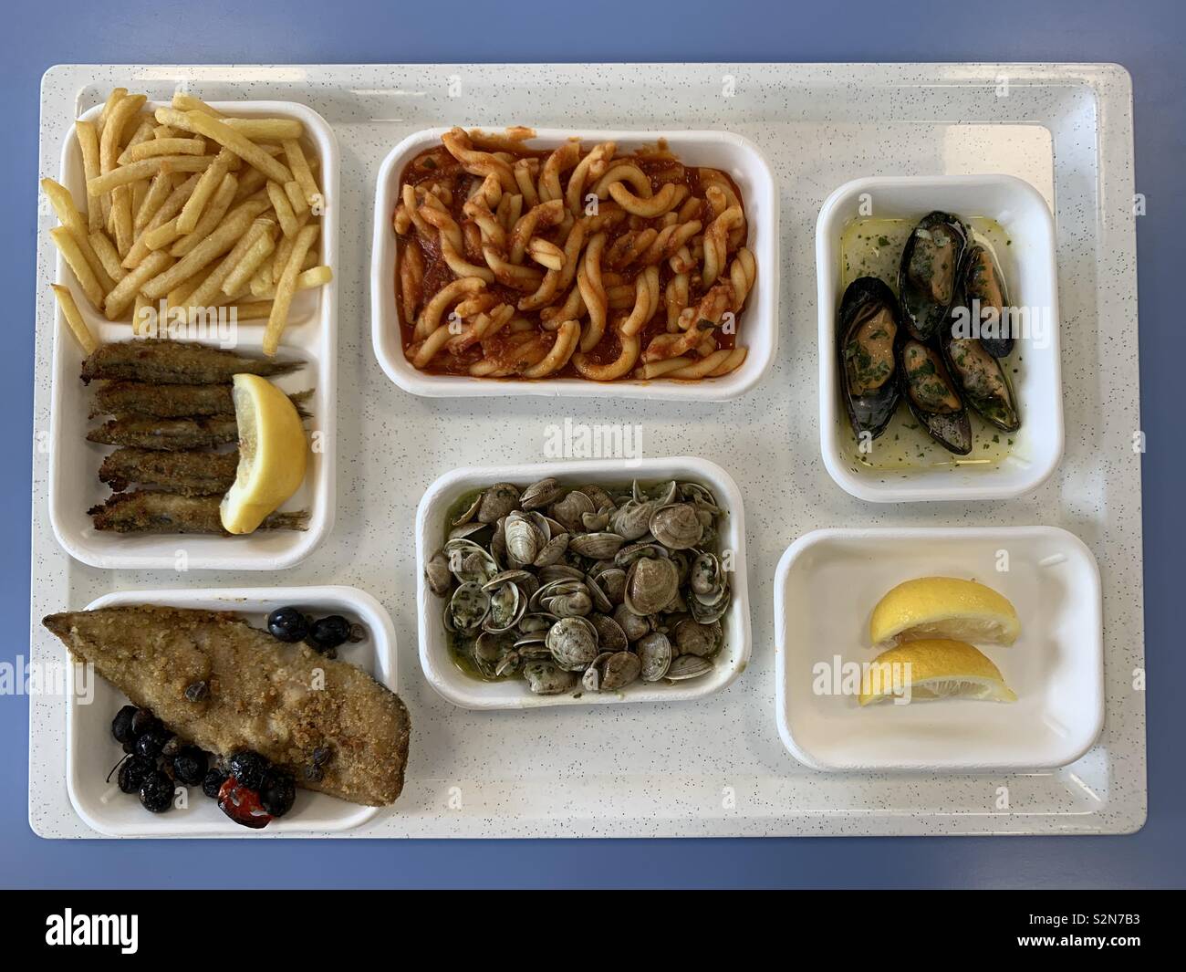 Self service fish restaurant, meal on board - Smartphone Captured Stock Image