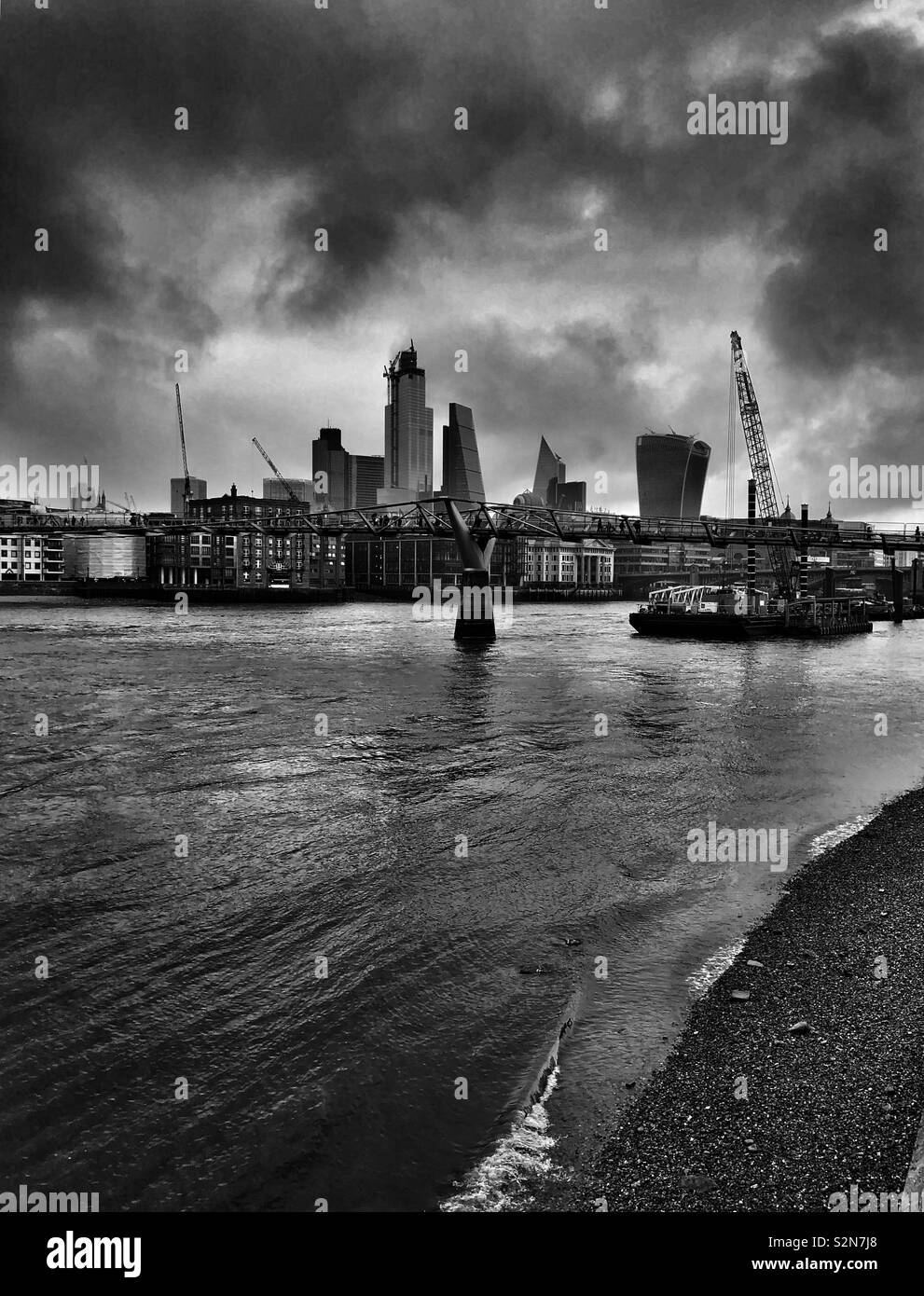 London skyline and dramatic clouds above the river Thames - Smartphone Captured Stock Image