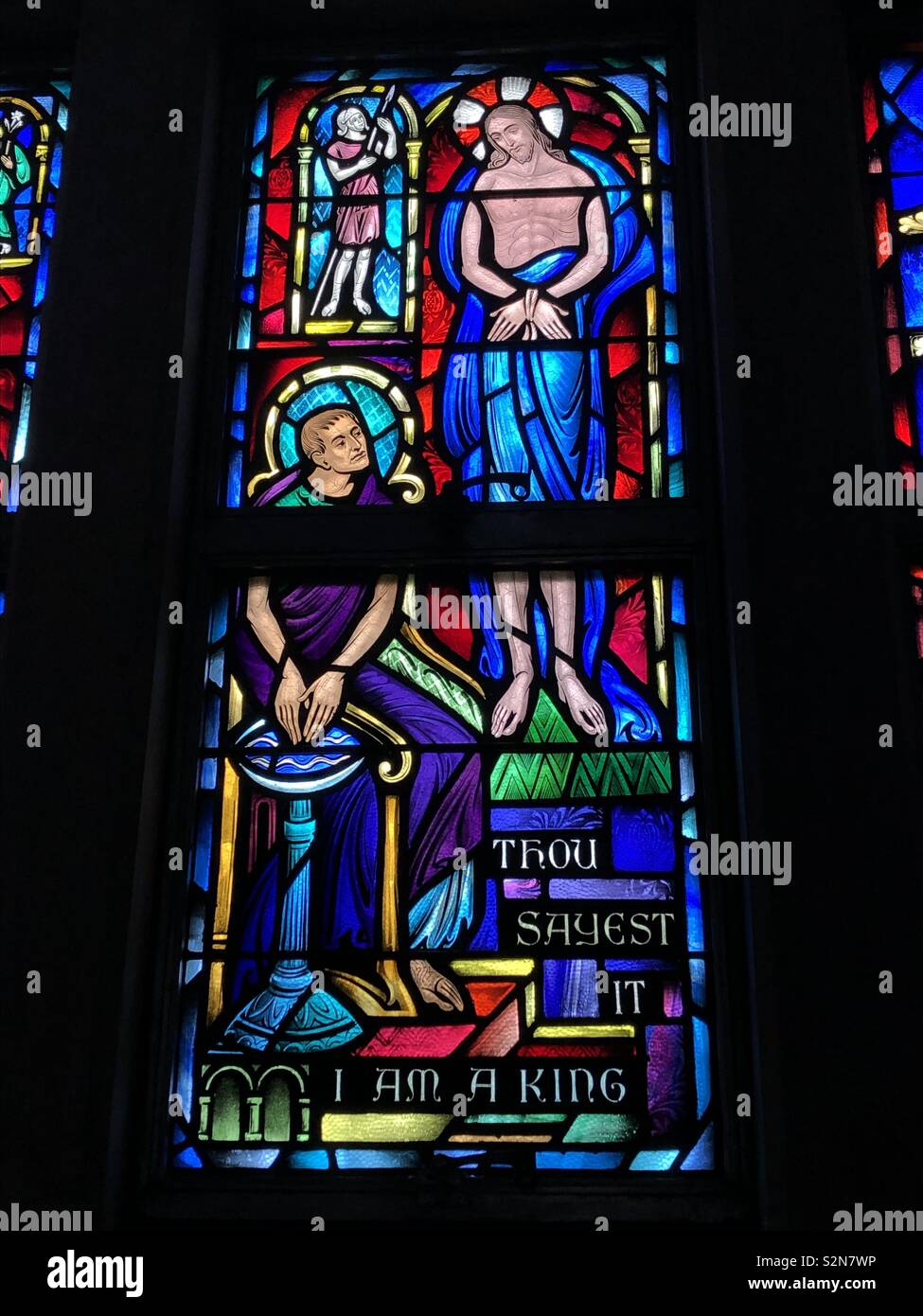 Stained glass image of Pontius Pilate and Jesus. Taken at St Rita