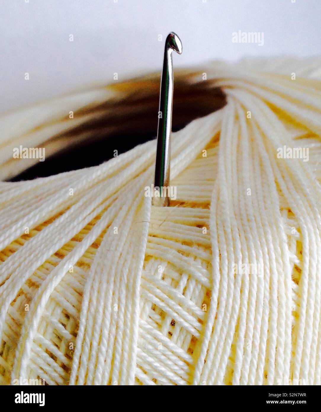 Crochet needle and thread Stock Photo Alamy