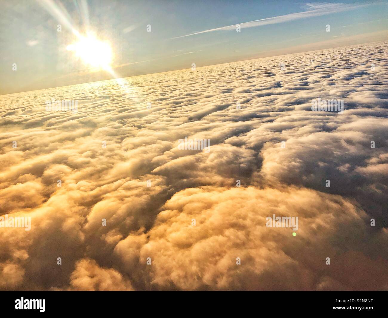 Above clouds sunshine Stock Photo