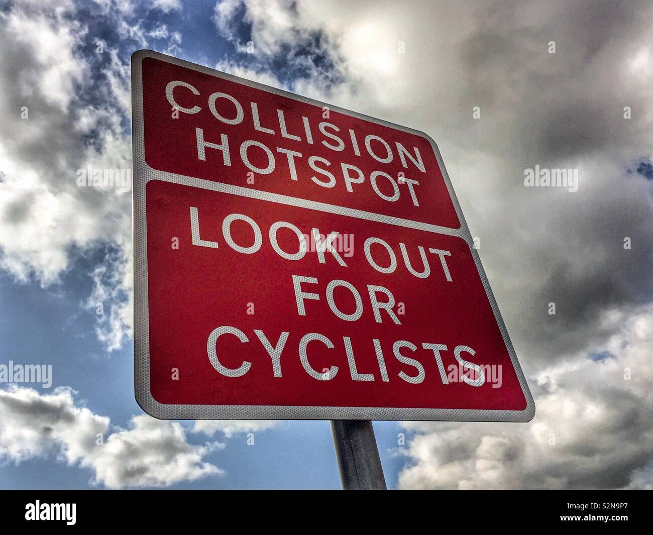 Collision hotspot, Look out for cyclists warning sign in England Stock Photo