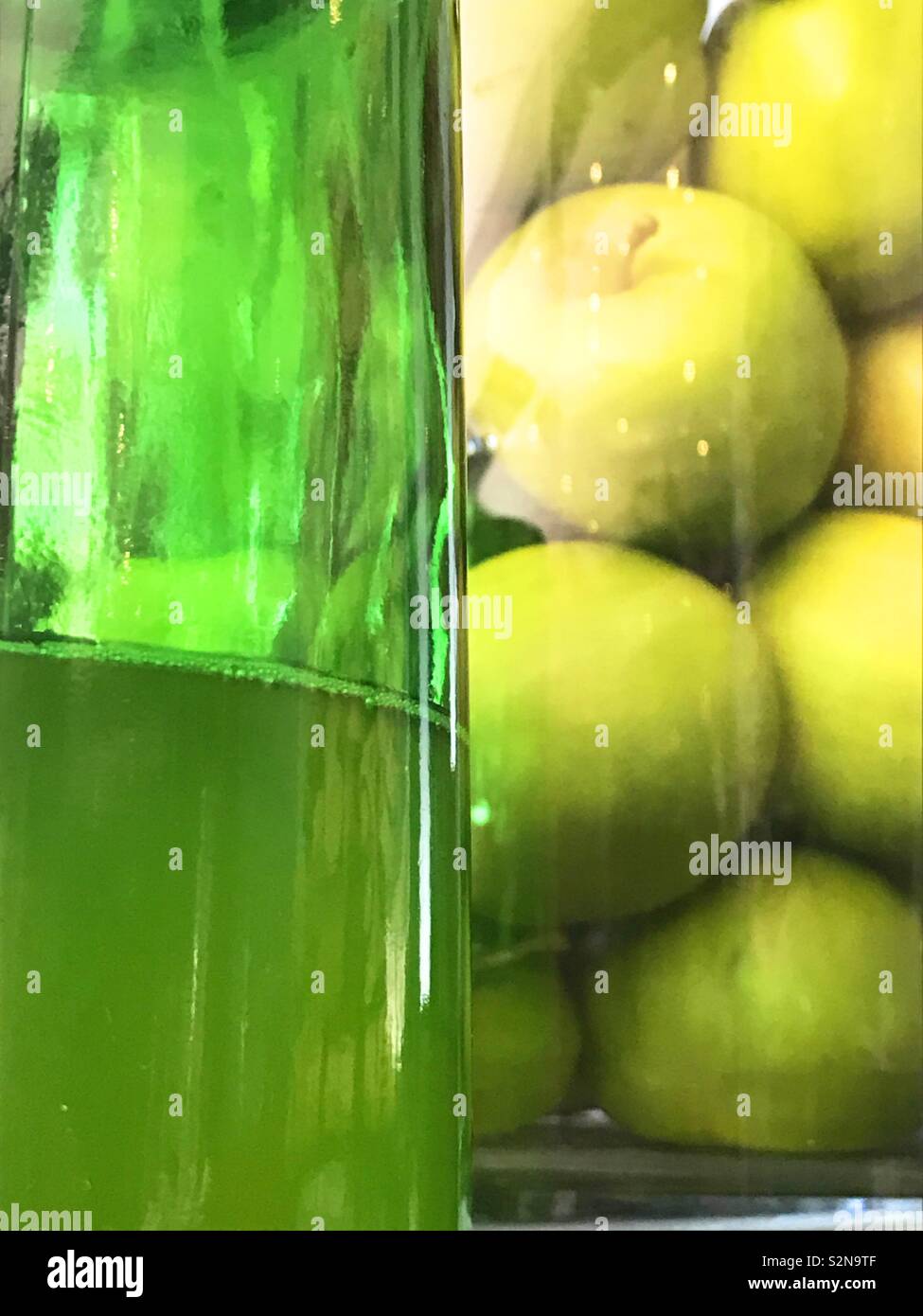 Bottle of cider and apples. - Smartphone Captured Stock Image
