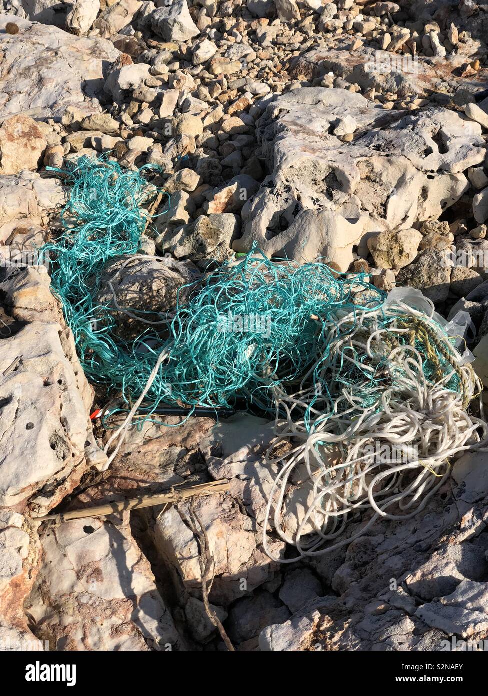 Fishing Nets Ocean Plastic Pollution Washed Up On Rocky Shore In Malta Stock Photo Alamy