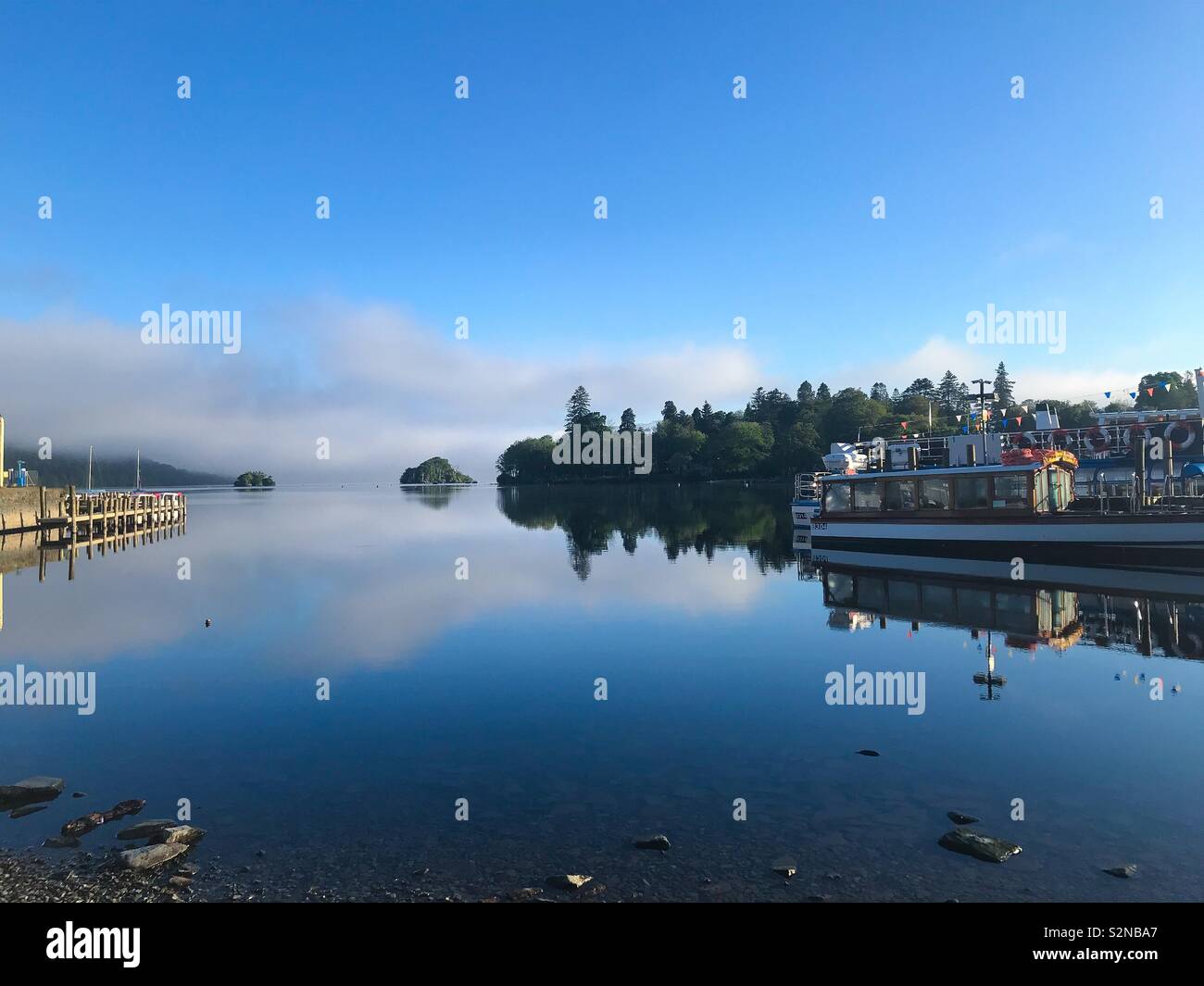 Bowness on Windermere. Still Lake. Stock Photo