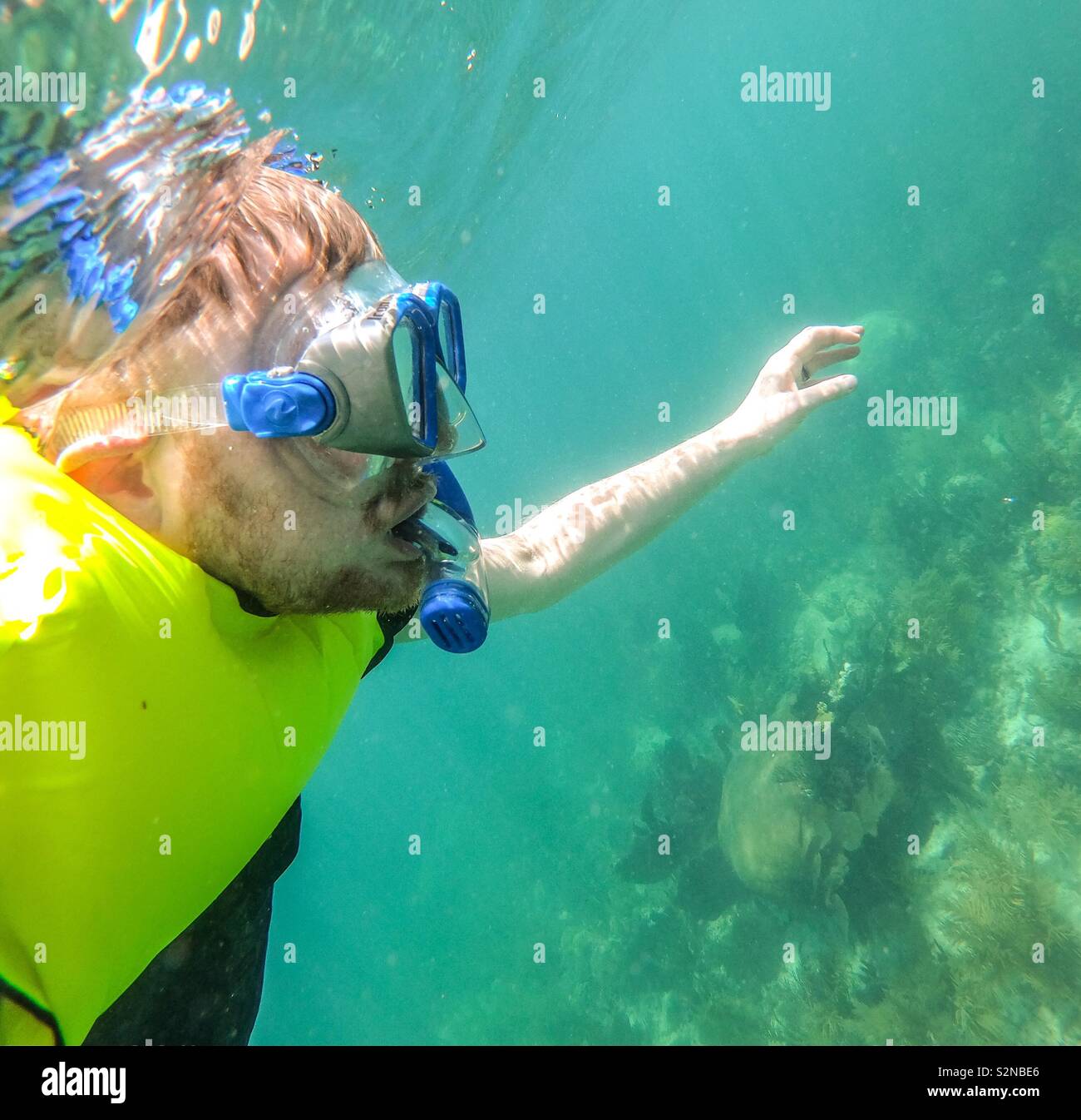 Underwater picture of man snorkelling Stock Photo